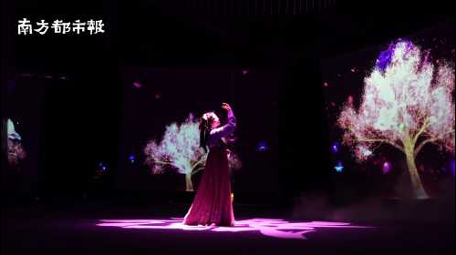 廣州燈光節“國潮”成熱詞，漢服小姐姐化身“紫衣仙子”翩翩起舞